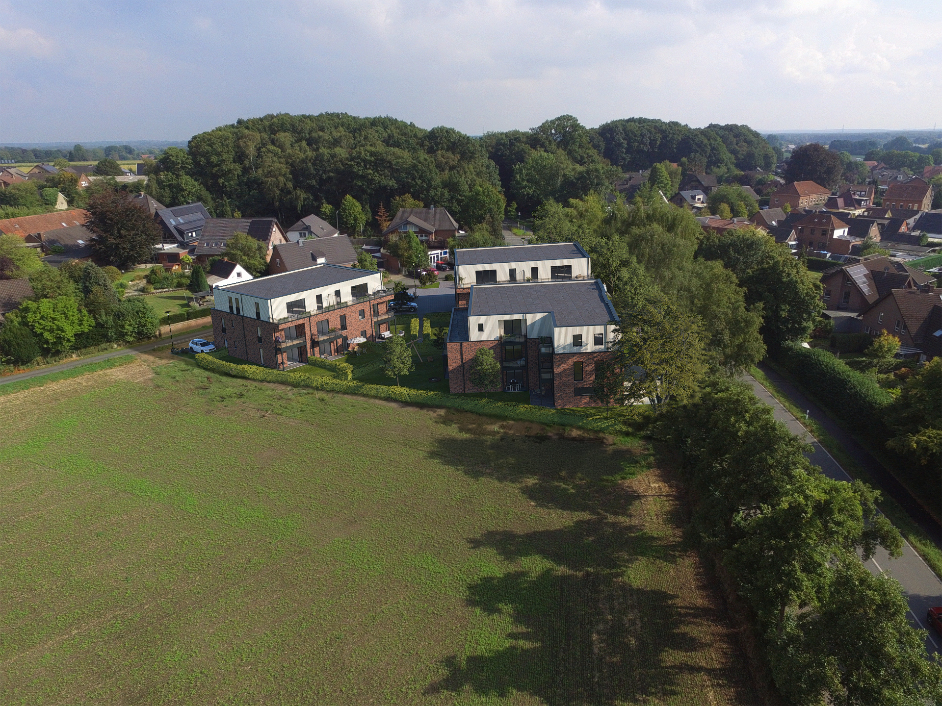 Luftbild-Fotomontage des Neubauprojekts in Hamminkeln-Brünen